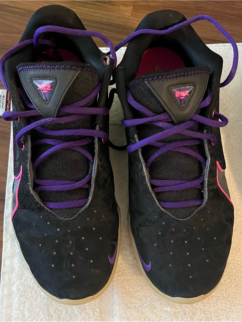 Nike Women’s Black Sneakers with Purple Laces and Pink Swoosh Accents